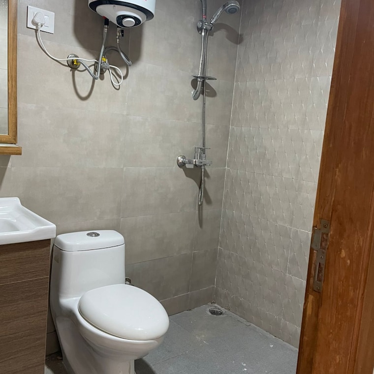 Bathroom, tulip-yellow 3 Bedroom 1704 Sq.Ft. Apartment In Sector 69 Gurgaon 9254450