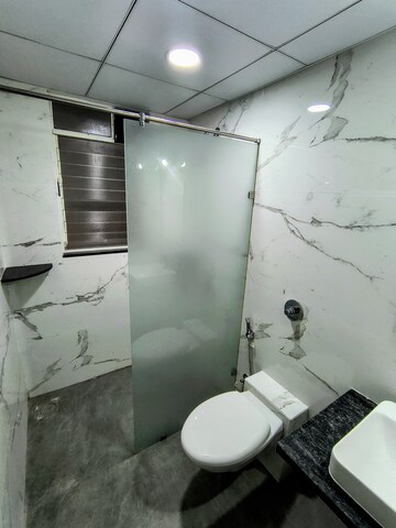 Bathroom in 2 BHK Apartment at Puravankara Silversands, Mundhwa – for Rent