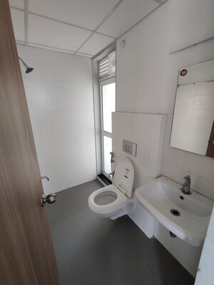 Bathroom in 1.5 BHK Apartment at Godrej Emerald, Ghodbunder Road – for Rent