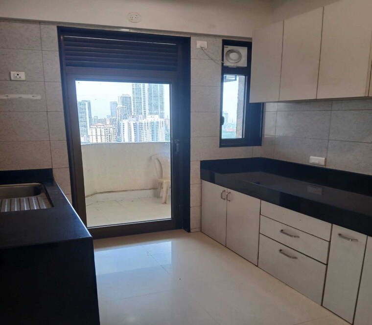 Kitchen, peninsula-celestia-spaces 3 Bedroom 1413 Sq.Ft. Apartment In Parel Mumbai 9254562