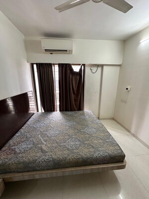 Bedroom in 2 BHK Apartment at Parijat CHS Azad Nagar, Andheri West – for Rent