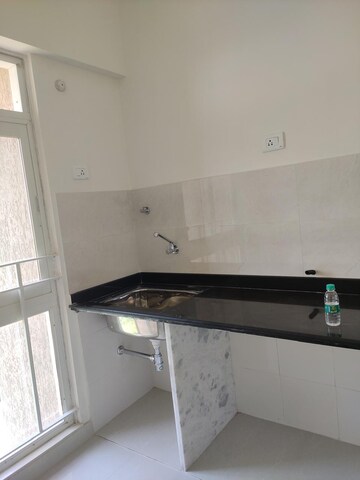 Kitchen in 1 BHK Apartment at JVM Sarvam, Ghodbunder Road – for Rent