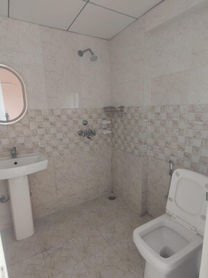 Bathroom in 3 BHK Apartment at Gaur Atulyam, Omicron I Greater Noida – for Sale