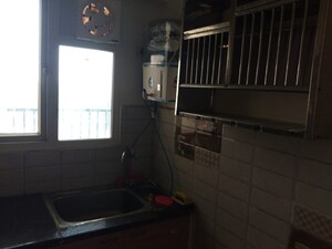 Kitchen in 2 BHK Apartment at Gaur Atulyam, Omicron I Greater Noida – for Sale