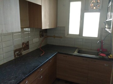 Kitchen in 2 BHK Apartment at Gaur Atulyam, Omicron I Greater Noida – for Sale
