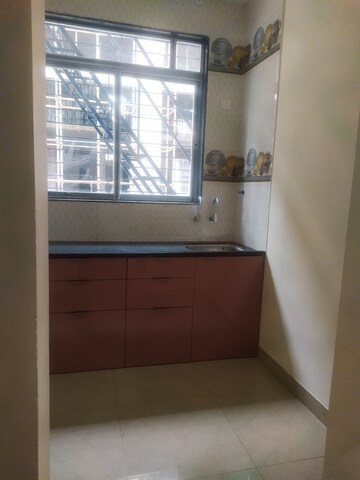 Kitchen in 1 BHK Apartment at Sai Shiv Sarovar Heritage, Khidkali – for Sale