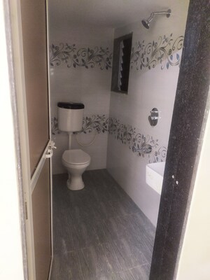 Bathroom in 1 BHK Apartment at Sai Shiv Sarovar Heritage, Khidkali – for Sale