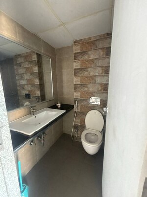 Bathroom in 2 BHK Apartment at Wadgaon Sheri – for Rent