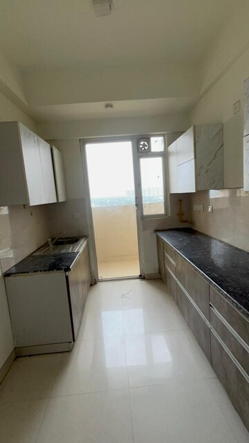 Kitchen in 1 BHK Apartment at Mira Nagar – for Sale