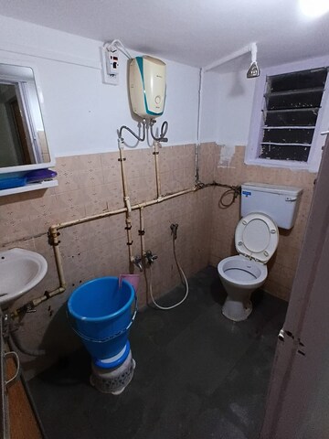 Bathroom in 1 BHK Apartment at Akruti SMC, Ganeshwadi – for Rent