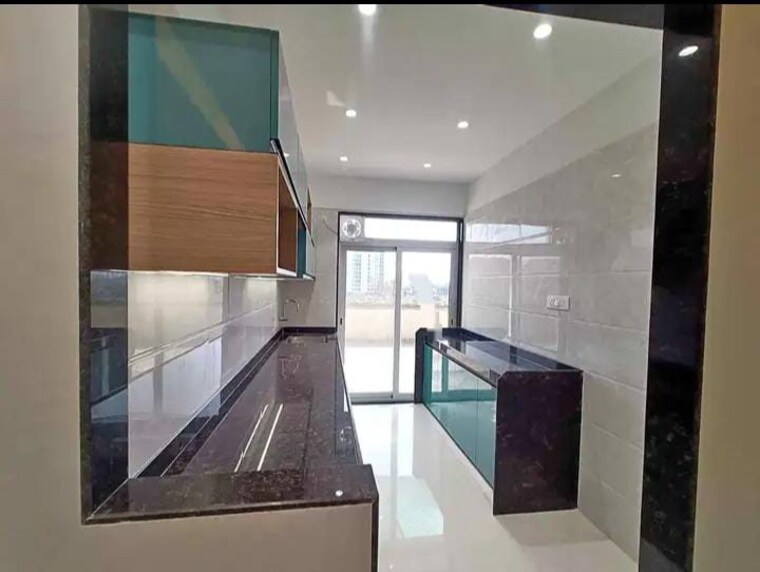 Kitchen, pearl-chs-mira-road 2 Bedroom 675 Sq.Ft. Apartment In Mira Road Thane 9254971