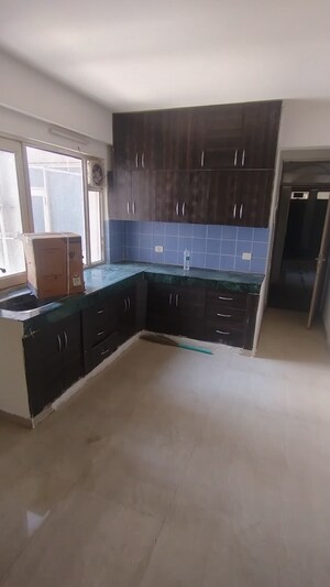 Kitchen in 2 BHK Apartment at ROF Aalayas, Sector 102 – for Rent