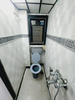 Bathroom in 2 BHK Apartment at Sagar Sangam, Bandra West – for Rent