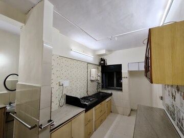 Kitchen in 1 BHK Apartment at Aakanksha Garden, Manpada – for Rent