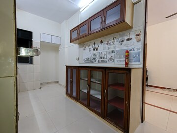 Kitchen in 1 BHK Apartment at Aakanksha Garden, Manpada – for Rent