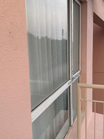 Balcony in 1 RK Apartment at Logix Blossom Zest, Sector 143 – for Rent