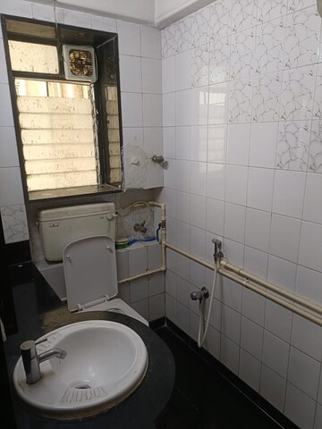 Bathroom in 2 BHK Apartment at Rajnigandha Shopping Centre, Goregaon East – for Rent