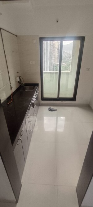 Kitchen in 1 BHK Apartment at Velocity Hill Spring, Ghodbunder Road – for Rent