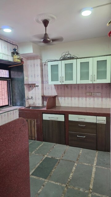 Kitchen in 2 BHK Apartment at Jimmy Tower Crystal, Kopar Khairane – for Rent