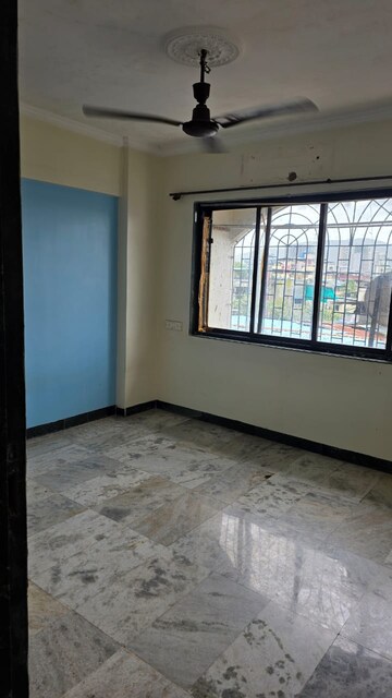 Room in 2 BHK Apartment at Jimmy Tower Crystal, Kopar Khairane – for Rent
