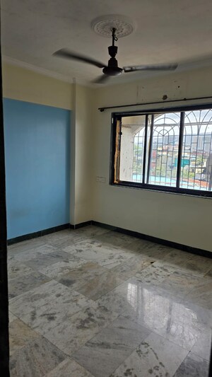 Room in 2 BHK Apartment at Jimmy Tower Crystal, Kopar Khairane – for Rent