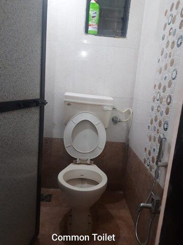 Bathroom in 1 BHK Apartment at Parijat Gardens Marigold CHS, Kasarvadavali – for Rent