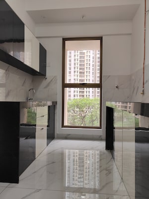 Kitchen in 1 BHK Apartment at Raymond Ten X Habitat, Pokhran Road No Two – for Sale