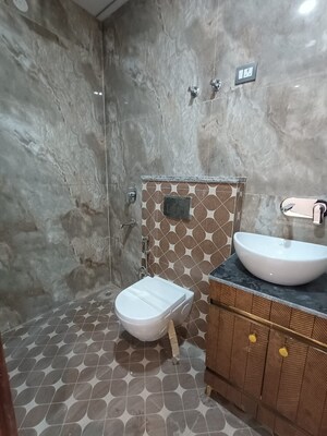 Bathroom in 4 BHK Builder Floor at Shakti Khand iv – for Sale