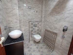 Bathroom in 4 BHK Builder Floor at Shakti Khand iv – for Sale