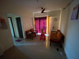 Living Room in 1 BHK Apartment at Rosa Elite, Bhayandarpada – for Rent