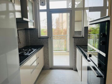 Kitchen in 3 BHK Apartment at DLF The Ultima, Sector 81 – for Sale