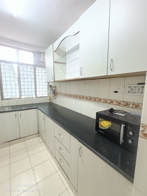 Kitchen in 1 BHK Apartment at Maple Heights, Sector 43 – for Rent