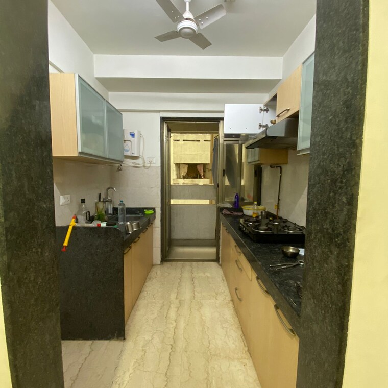 Kitchen, dn nagar 2 Bedroom 640 Sq.Ft. Apartment In Dn Nagar Mumbai 9255541