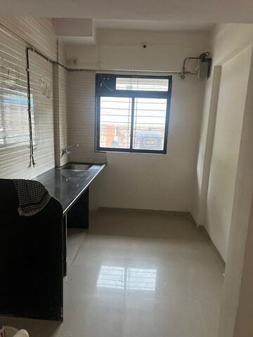 Kitchen in 2 BHK Apartment at Vighnahar CHS, Kharigaon – for Rent
