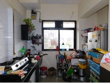 Kitchen in 1 BHK Apartment at Raunak Unnathi Greens, Kasarvadavali – for Sale