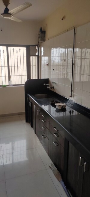 Kitchen in 2 BHK Apartment at Happy Valley, Manpada – for Sale