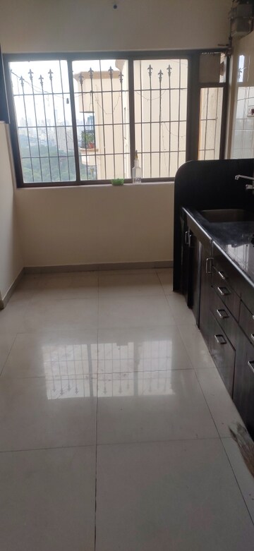 Kitchen in 2 BHK Apartment at Happy Valley, Manpada – for Sale
