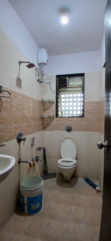 Bathroom in 2 BHK Apartment at Sunil Nivas Society, Andheri West – for Rent
