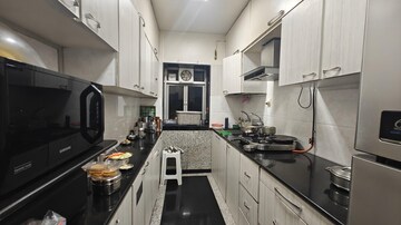 Kitchen in 2 BHK Apartment at Worli Residency, Worli – for Rent