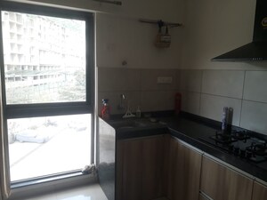 Kitchen in 1 BHK Apartment at Gera Adara, Hinjewadi – for Rent