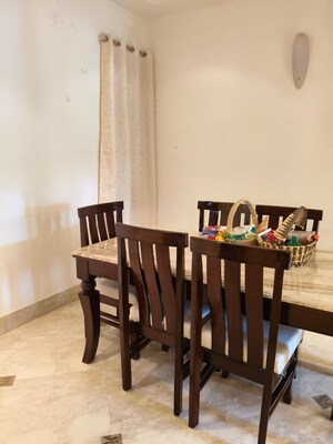 Dining area in 4 BHK Builder Floor at Boutique Residential Apartments A 3 2, Vasant Vihar – for Rent
