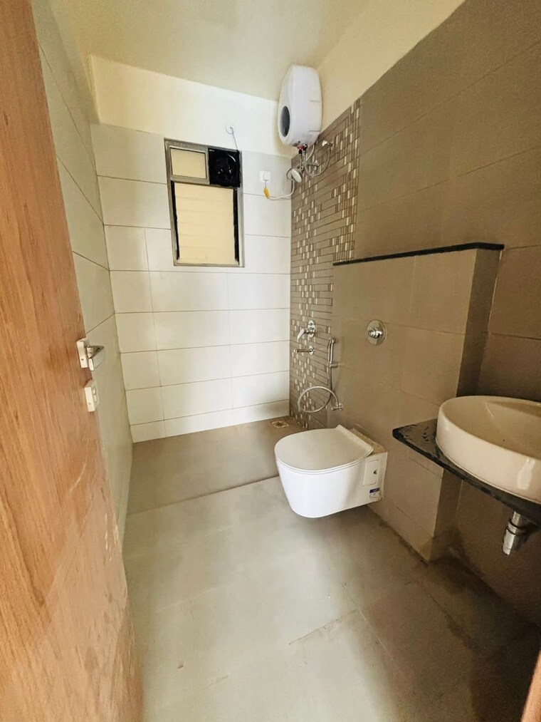 Bathroom, gera-world-of-joy 2.5 Bedroom 850 Sq.Ft. Apartment In Kharadi Pune 9256314