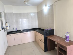 Kitchen in 3 BHK Apartment at Belvalkar Mitrangan, Baner – for Rent