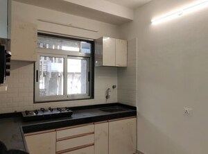 Kitchen in 1 BHK Apartment at Gowda Palash, Malad West – for Sale