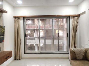 Living Room in 1 BHK Apartment at Gowda Palash, Malad West – for Sale