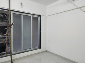 Living Room in 1 BHK Apartment at Gowda Palash, Malad West – for Sale