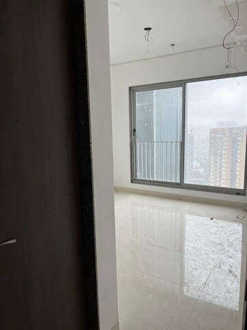 Room in 3 BHK Apartment at Sunteck City Avenue 4, Goregaon West – for Sale