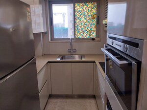 Kitchen in 1 BHK Apartment at Hiranandani Regent Hill, Powai – for Rent