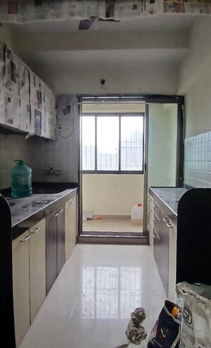 Kitchen in 2 BHK Apartment at Sunil Nivas Society, Andheri West – for Rent