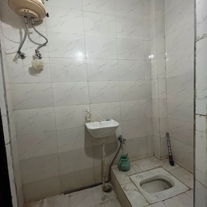 Bathroom in 1 BHK Builder Floor at Chattarpur – for Rent